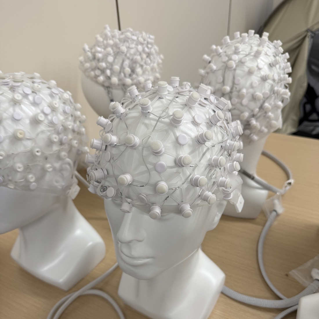 High-density EEG caps on display